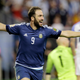 Photo of Higuaín responding to the question “How much did Juve pay for you?” via Getty